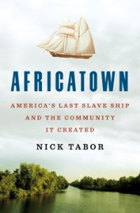 Hold a copy of Africatown