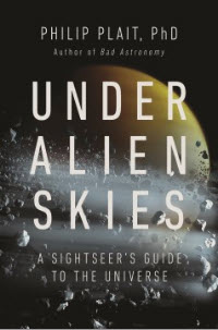 Hold a copy of Under Alien Skies
